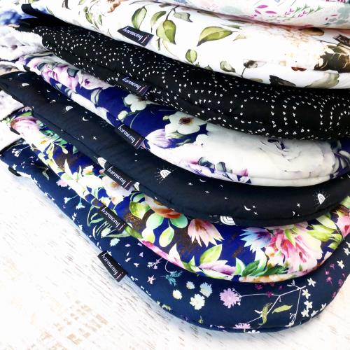 Multiple patterned fabric pram liners stacked upon each other 