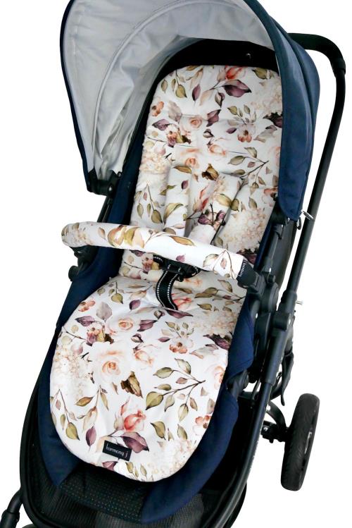 White floral fabric Harmony J pram liner and handle bar cover on a pram